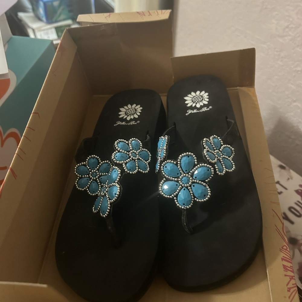 Yellow Box Black Sandals with Blue Floral Accents